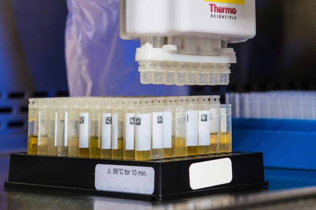 ICP-MS testing laboratory instrument with plasma torch and trace element analysis