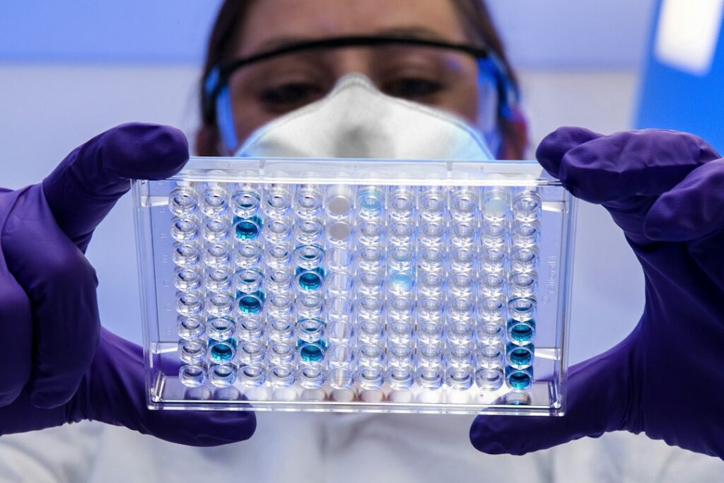 laboratory technician handling specimens in a trace metals laboratory